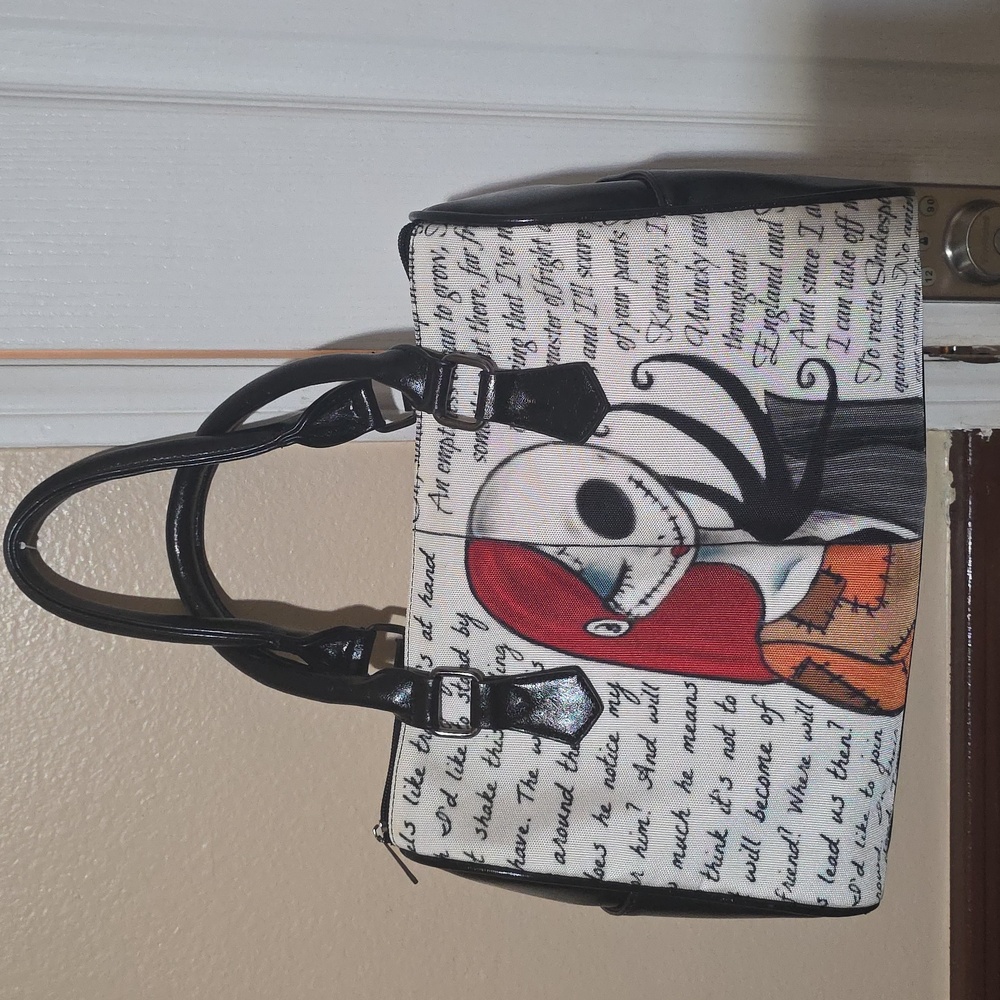 Stylish Black and White Handbag with Unique Design